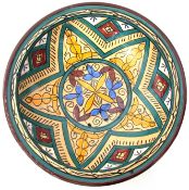 Large bowl with geometric design in yellow, blue and green within a criss-cross border, 30cm diam