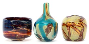 Group of Art Glass wares with streaked designs, comprising a faceted vase with green and brown