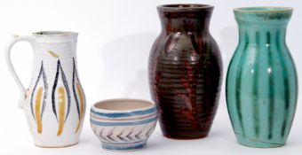 Group of Studio Pottery comprising two baluster vases, a further ewer and small bowl, the pieces