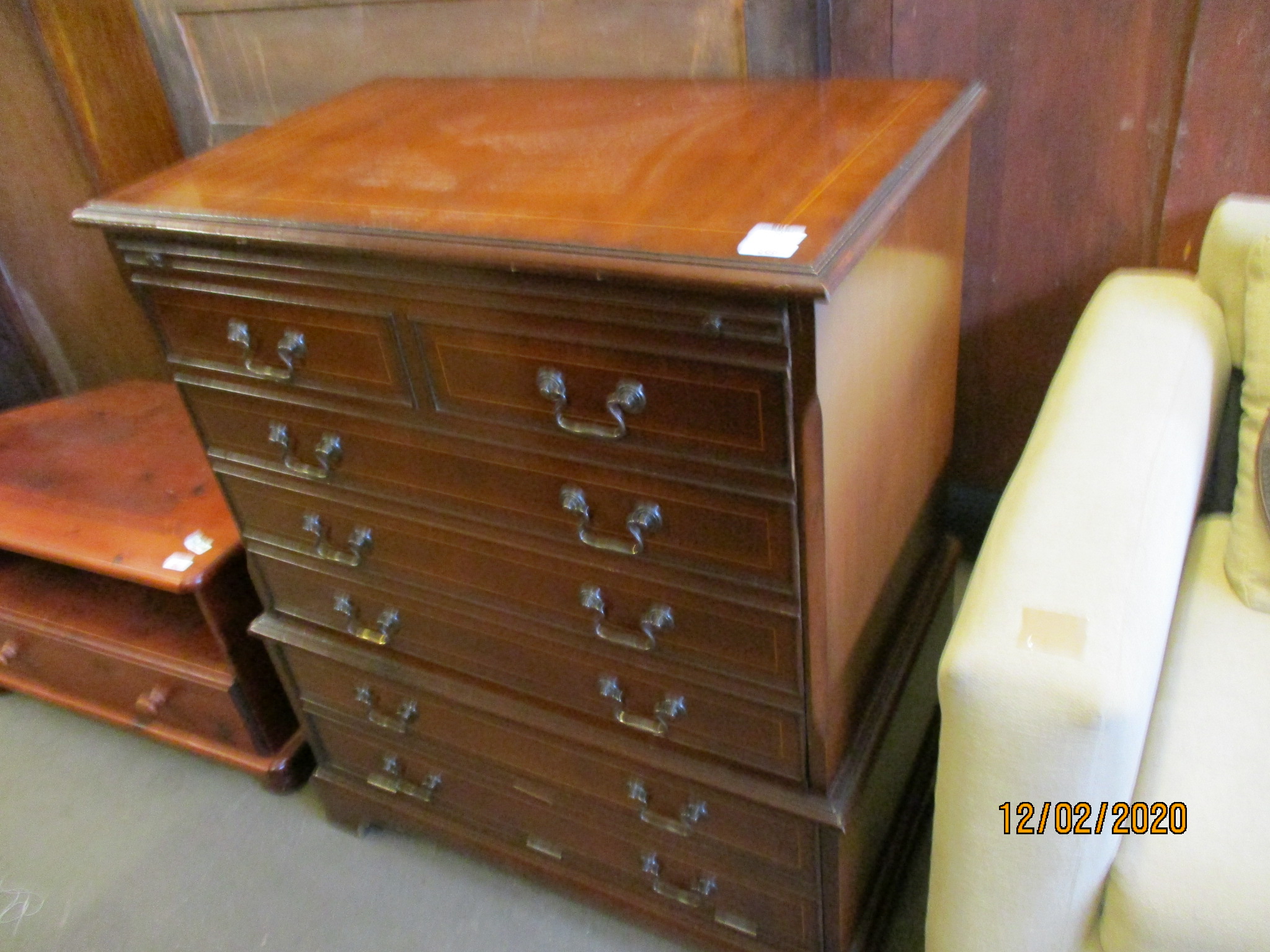 REPRODUCTION MAHOGANY MUSIC CABINET FORMED AS A FOUR FAUX DRAWER CHEST