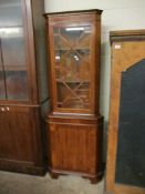 REPRODUCTION MAHOGANY AND YEW WOOD ASTRAGAL GLAZED CORNER CUPBOARD