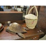 EASTERN HARDWOOD CARVED MODEL OF A TURTLE AND A WICKER BASKET
