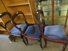 THREE 19TH CENTURY MAHOGANY BALLOON BACK DINING CHAIRS WITH BLUE DRALON DROP IN SEATS AND REEDED