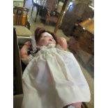 VINTAGE DOLL IN LACED CLOTHING AND BONNET