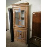 VICTORIAN PITCH PINE FLOOR STANDING CORNER CUPBOARD WITH TWO GLAZED DOORS OVER TWO PANELLED CUPBOARD