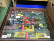 WALL MOUNTED CASE CONTAINING USED DIE-CAST TOY VEHICLES, MATCHBOX VEHICLES ETC