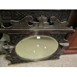 EDWARDIAN MAHOGANY WALL MIRROR WITH SWAN NECK PEDIMENT AND CARVED DETAIL WITH OVAL INSET MIRROR