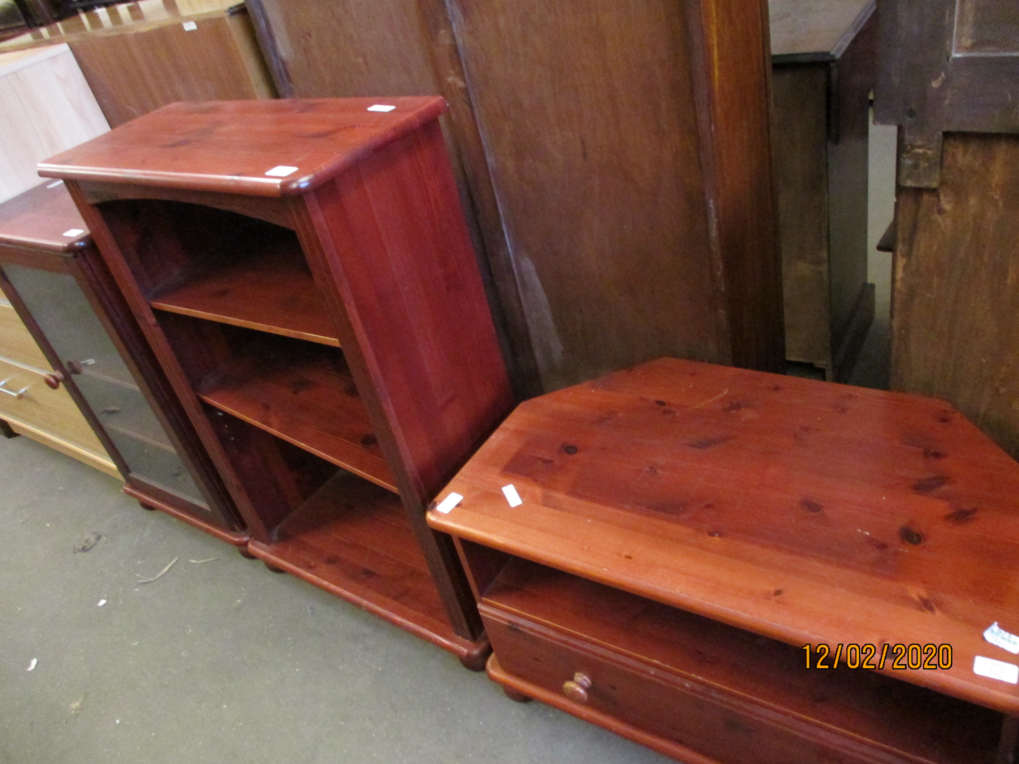 STAINED PINE SINGLE GLAZED DOOR MUSIC CABINET, AN ADJUSTABLE BOOKSHELF AND A TV CABINET (3)