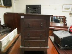 BEECHWOOD FRAMED THREE DRAWER BEDSIDE CHEST WITH RINGLET HANDLES