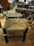 EBONISED RATTAN TOP SQUARE FORMED FOOT STOOL TOGETHER WITH A FURTHER BOBBIN TURNED CANE TOP STOOL (