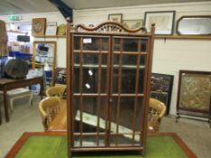 GOOD QUALITY BENTWOOD TYPE WALL CABINET WITH TWO GLAZED DOORS WITH SHAPED TOP AND URN FINIALS FITTED