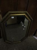 RECTANGULAR GILT FRAMED WALL MIRROR WITH CANTED CORNERS AND BEVELLED GLASS