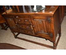DARK OAK REPRODUCTION SIDEBOARD WITH CENTRAL DRAWERS FLANKED BY CUPBOARDS