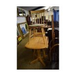 MODERN PINE DROP LEAF KITCHEN TABLE AND TWO STICK BACK CHAIRS