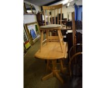 MODERN PINE DROP LEAF KITCHEN TABLE AND TWO STICK BACK CHAIRS