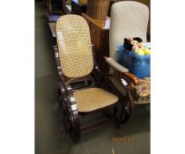 BENTWOOD CANE SEATED AND BACK ROCKING CHAIR