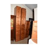 MODERN PINE STORAGE OR WARDROBE UNIT COMPRISING THREE COMPARTMENTS WITH THREE DRAWERS AND CUPBOARDS