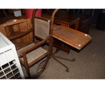 VINTAGE CANE BACKED AND SEATED INVALID CHAIR AND FURTHER ADJUSTABLE OAK AND CAST METAL FRAMED BED