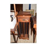 PAIR OF STAINED OAK CD RACKS, EACH WITH DRAWERS OVER