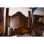 GOOD QUALITY STAINED BEECHWOOD FRAMED DOUBLE BED WITH HEAVILY CARVED SHELL TOP AND SWAG DECORATION