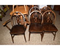 SET OF FIVE DARK FINISH ERCOL STICK BACK DINING CHAIRS COMPRISING FOUR SINGLES AND A CARVER