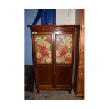 MAHOGANY FRAMED PAINTED PANELLED CUPBOARD RAISED ON BUN FEET