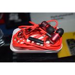 RED PAIR OF HEADPHONES