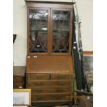 EDWARDIAN MAHOGANY BUREAU BOOKCASE WITH TWO ASTRAGAL GLAZED DOORS OVER DROP FRONT WITH TWO DRAWERS