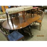 ROSEWOOD CROSS BANDED MAHOGANY TWIN PEDESTAL DINING TABLE WITH BRASS PAW FEET, 19TH CENTURY