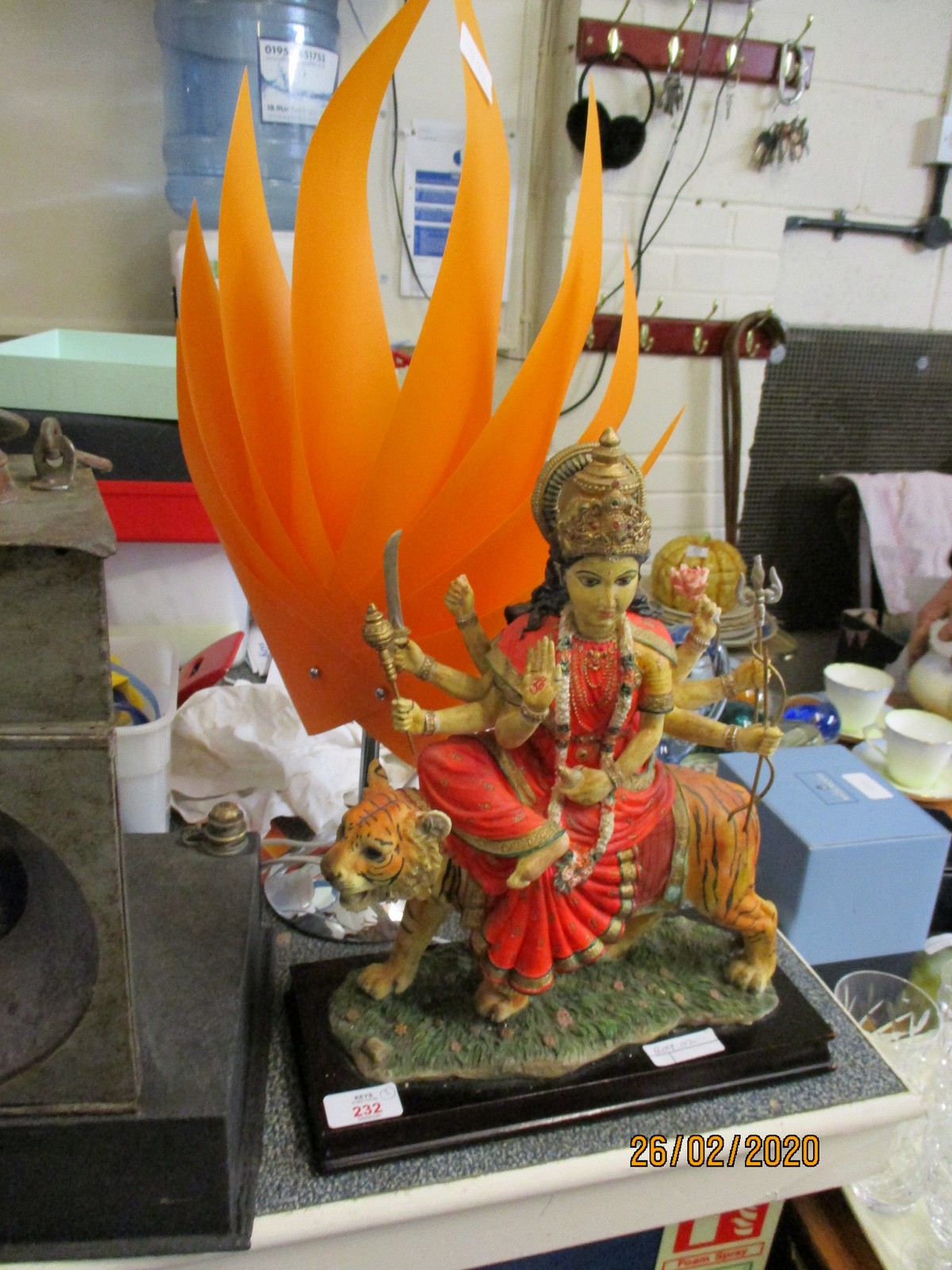 MODERN MODEL OF A SHIVA SEATED ON A TIGER, GLASS JUG AND MODERN TABLE LAMP