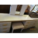 MELAMINE THREE DRAWER CHEST AND A FURTHER MATCHING TWIN PEDESTAL TRIPLE MIRROR BACK DRESSING TABLE