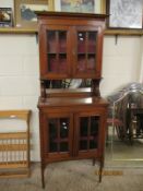 LATE 19TH CENTURY MAHOGANY SIDE CABINET WITH GLAZED TOP AND BOTTOM AND CENTRAL MIRROR