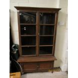 MAHOGANY FRAMED BOOKCASE WITH TWO GLAZED DOORS OVER TWO PANELLED CUPBOARD DOORS