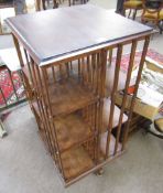 Late 19th/early 20th century stained wood revolving bookcase of 12 sections with spindle and slat