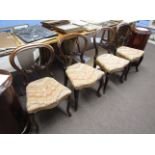 Set of four mid-Victorian mahogany balloon back dining chairs with fleur de lys style carved