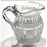 Early 19th century cut glass water jug, probably Irish, circa 1810, the glass with hobnail cut above