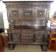 Italian large oak side cabinet moulded corners over three cupboards with an open shelf below,
