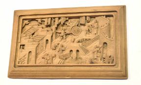 Carved wooden Oriental panel with figures in a rickshaw and other figures in various pursuits,