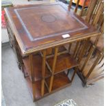 Early 20th century stained wood revolving bookcase of 8 sections with slatted uprights, the top