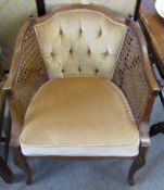 Early 20th century walnut framed Bergere and mushroom Dralon upholstered armchair with Dralon drop