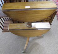 19th century mahogany two-tier dumb waiter with two drop down circular tiers to a turned column