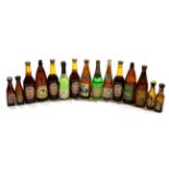 Box of various miniature beer bottles