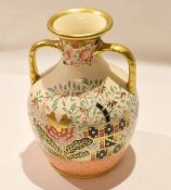 19th century English Porcelain vase, the baluster body with two gilt handles and gilt rim