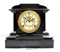 Victorian marble effect cast metal mantel clock, 29cm wide