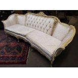 French style cream damask upholstered large four-seater settee with serpentine front and pierced and