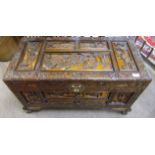 20th century Burmese carved hardwood and camphor lined storage chest heavily carved to all sides