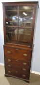 19th century mahogany glaze top side cabinet, a four panelled door opening to reveal two shelves