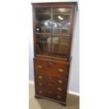 19th century mahogany glaze top side cabinet, a four panelled door opening to reveal two shelves