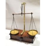 Set of Victorian brass beam scales and weights, on a mahogany single drawer base, 62cm high