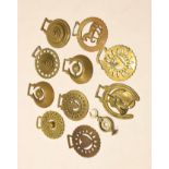 Box of various horse brasses